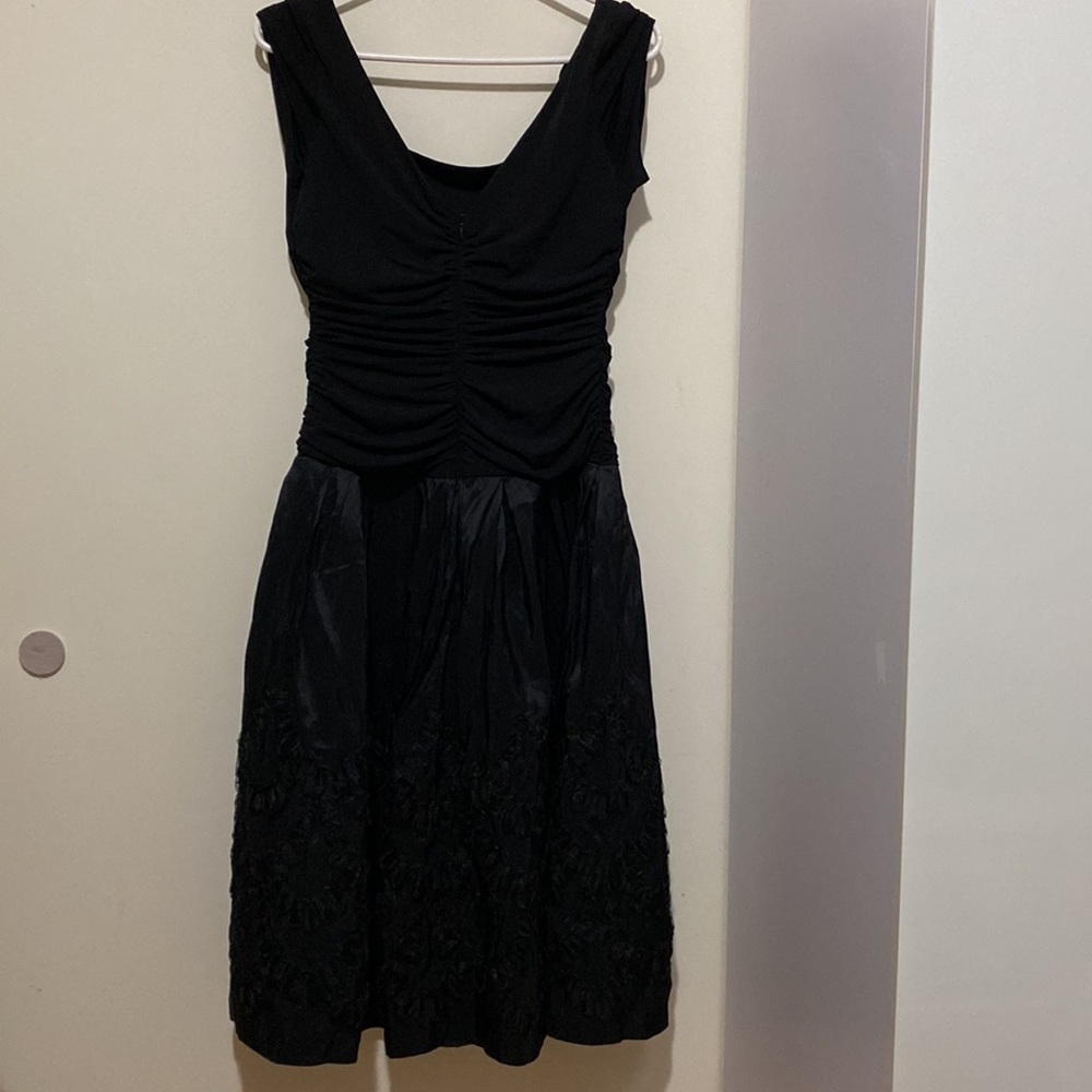 Hand stitched floral black dress. Great condition.